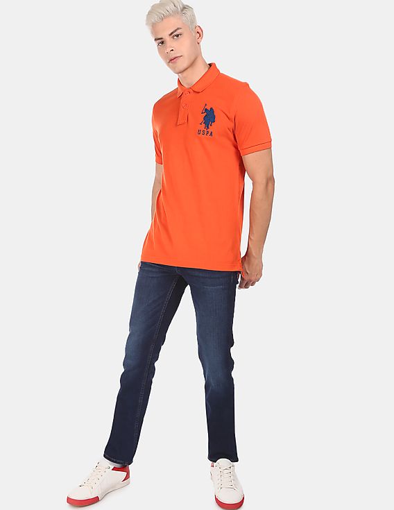 US POLO ASSN. GOLF PRO FIT SHORT SLEEVE POLO SHIRT | ORANGE