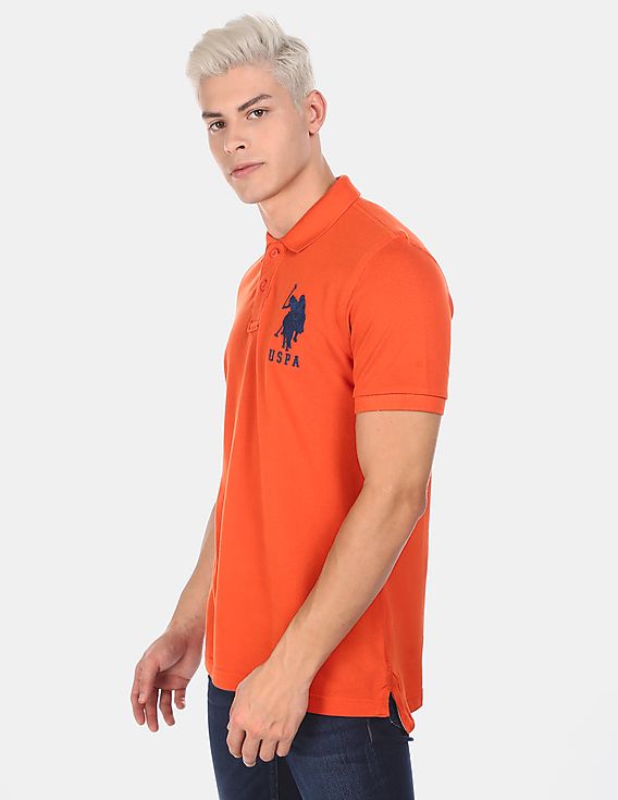 US POLO ASSN. GOLF PRO FIT SHORT SLEEVE POLO SHIRT | ORANGE