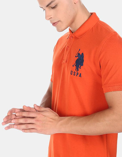 US POLO ASSN. GOLF PRO FIT SHORT SLEEVE POLO SHIRT | ORANGE