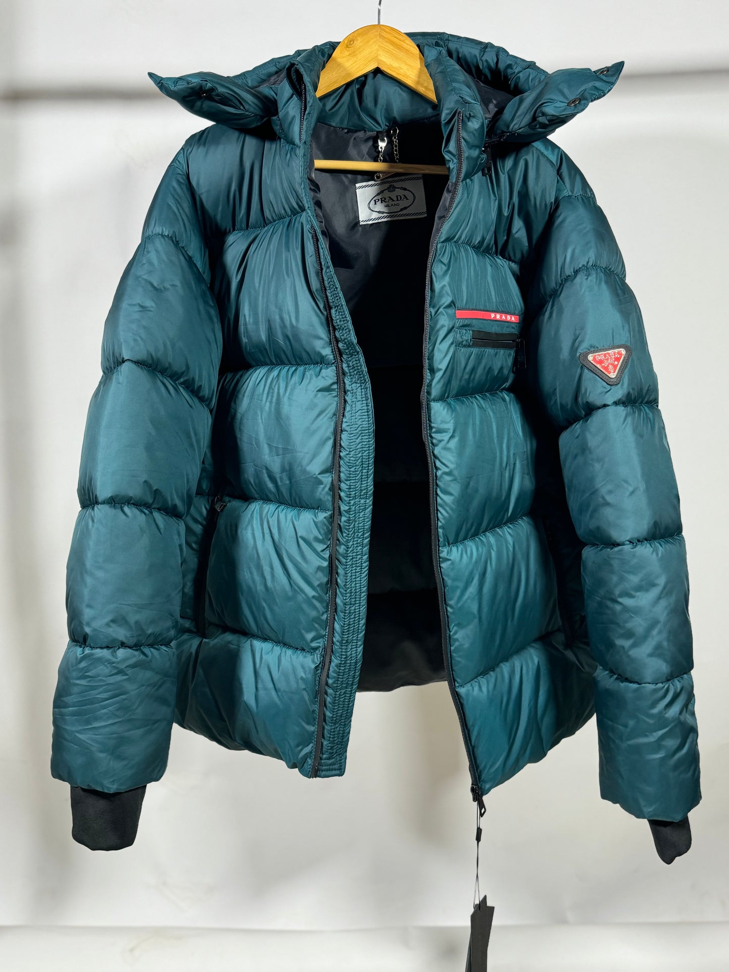 PRADA Men’s Premium Petrol Blue Puffer Jacket with Leather Patches and Detachable Hood