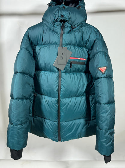 PRADA Men’s Premium Petrol Blue Puffer Jacket with Leather Patches and Detachable Hood